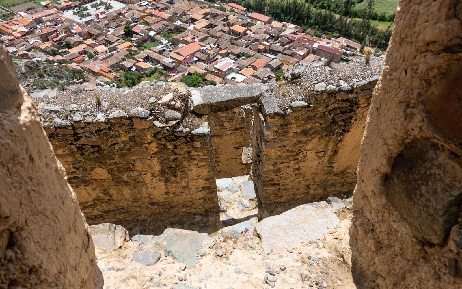 Inca storehouses clinging to the cliffs of Pinkuylluna above Ollantaytambo